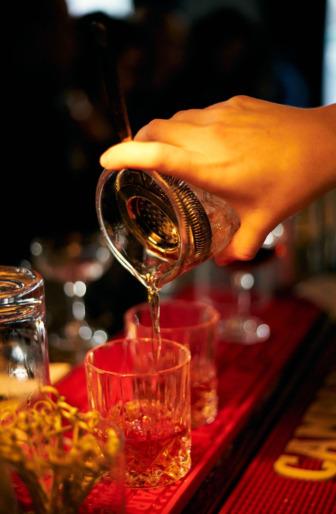 Serving a cocktail in an Aztec Cocktail Glass